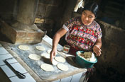 Elena at fuel efficient cook stove in Guatemala